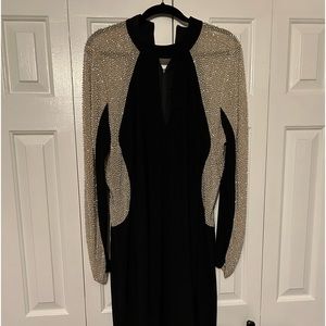 Escape knee length black and beaded dress